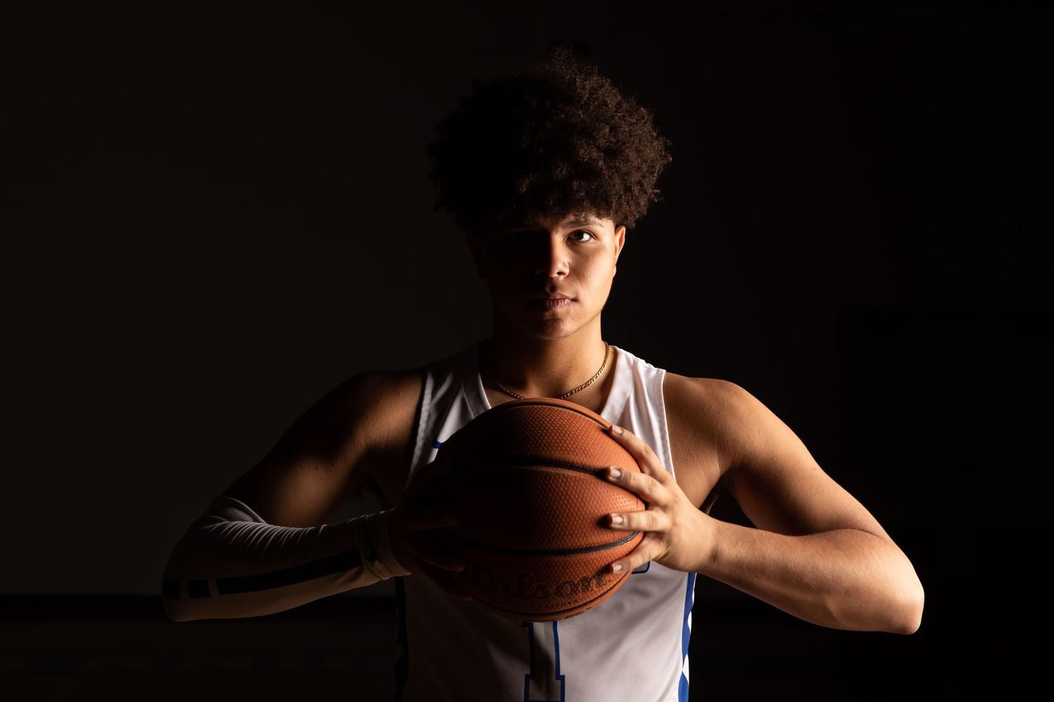 Split Lighting boys basketball senior portrait