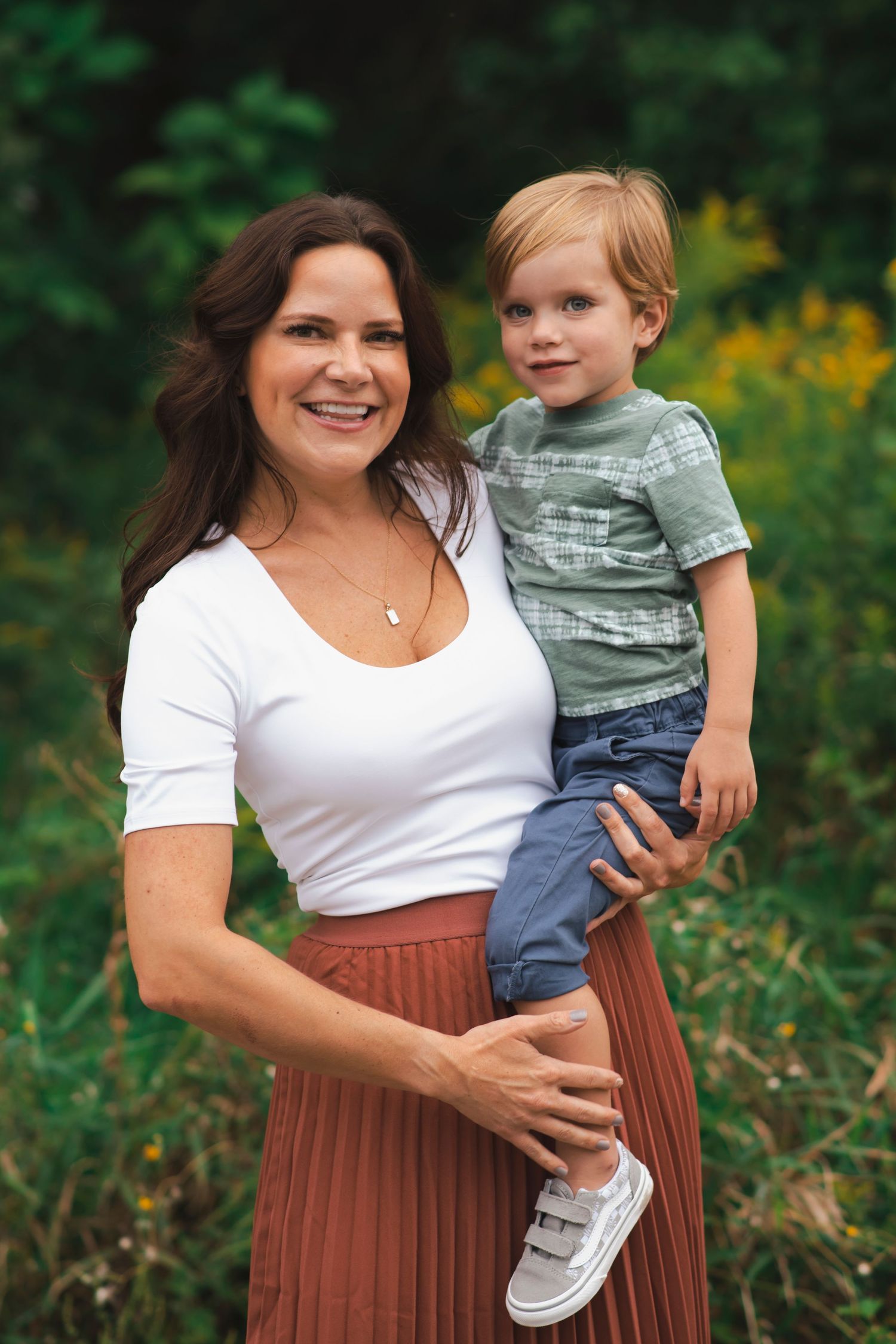 mother son portrait fall green orange field forest photo
