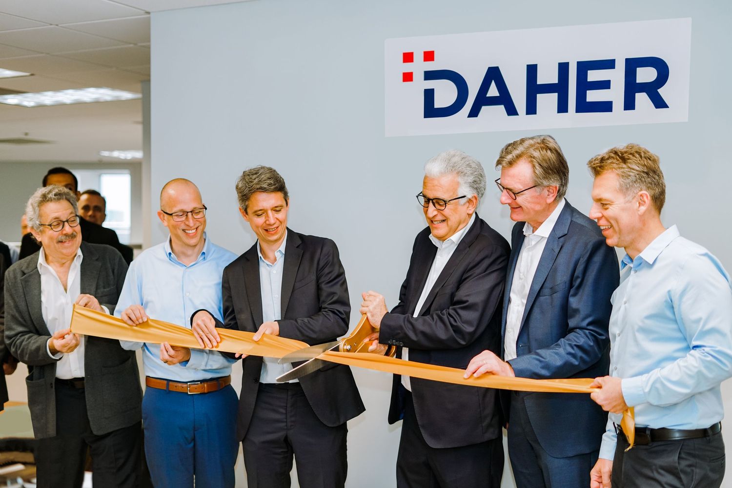 a corporate office ribbon cutting for aerospace aircraft company Daher in florida