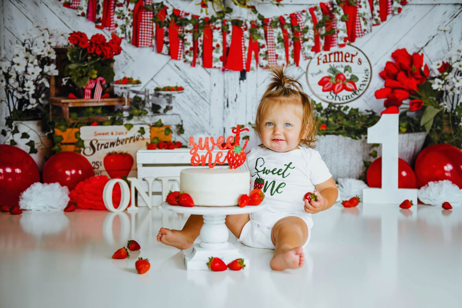 baby girl eating cake