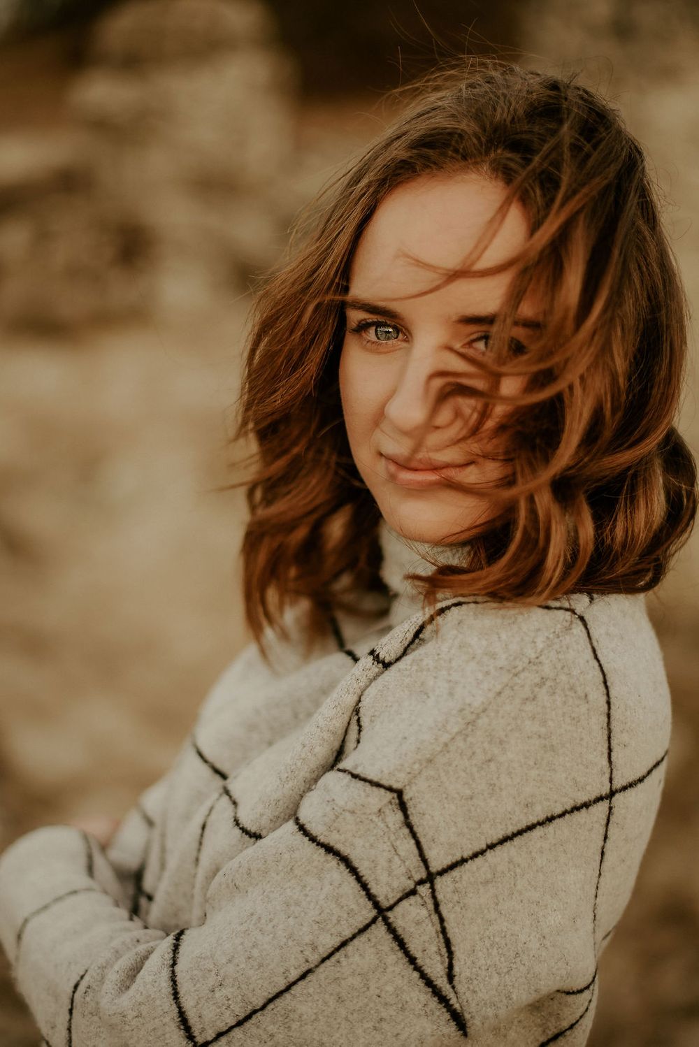 Artistic sepia portraits showing movement and emotion in an outdoor setting.
