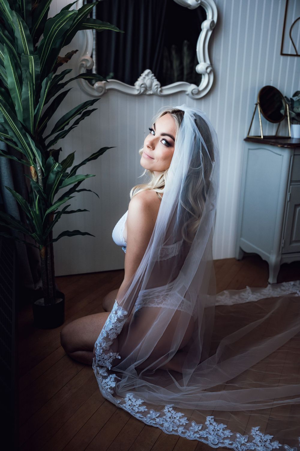 Romantic bridal boudoir session illuminating the bride's inner glow and love for her partner - Boudies by Katie May Clic