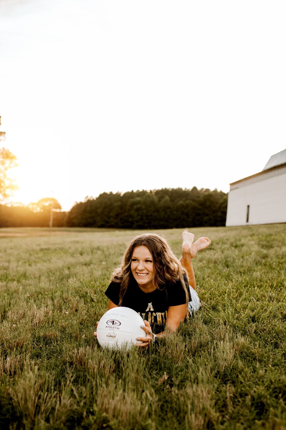 Senior portraits in Denver NC with natural backdrop and warm tones