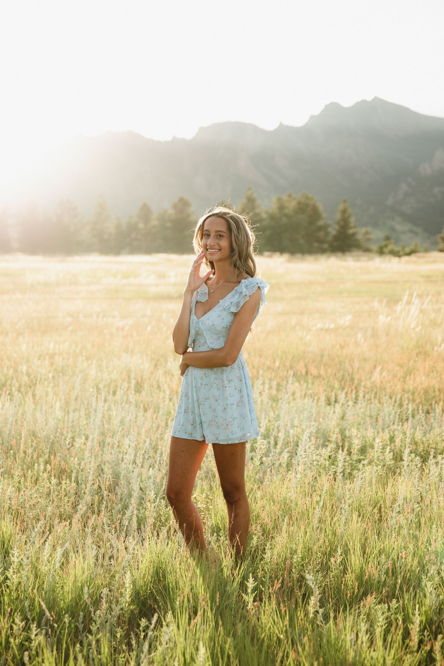 Sara Prue Photography captures the spirit of youth in this stunning high school senior portrait at Flatirons Trailhead Vista