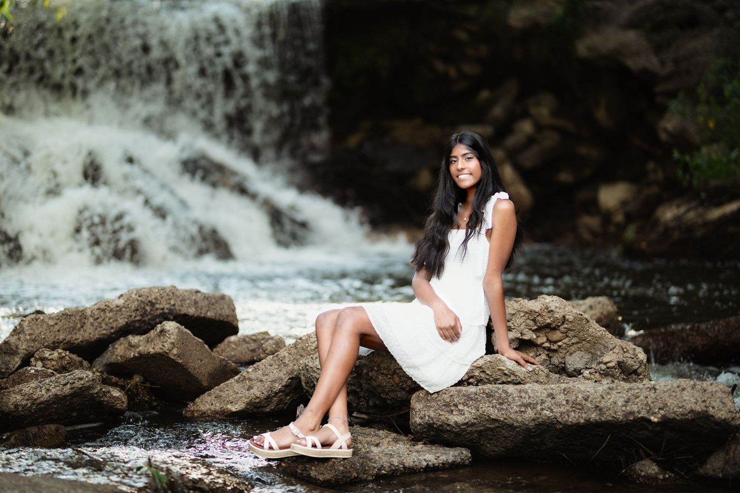 Capturing a senior's milestone in the beauty of Longmont: A portrait session at Golden Ponds.