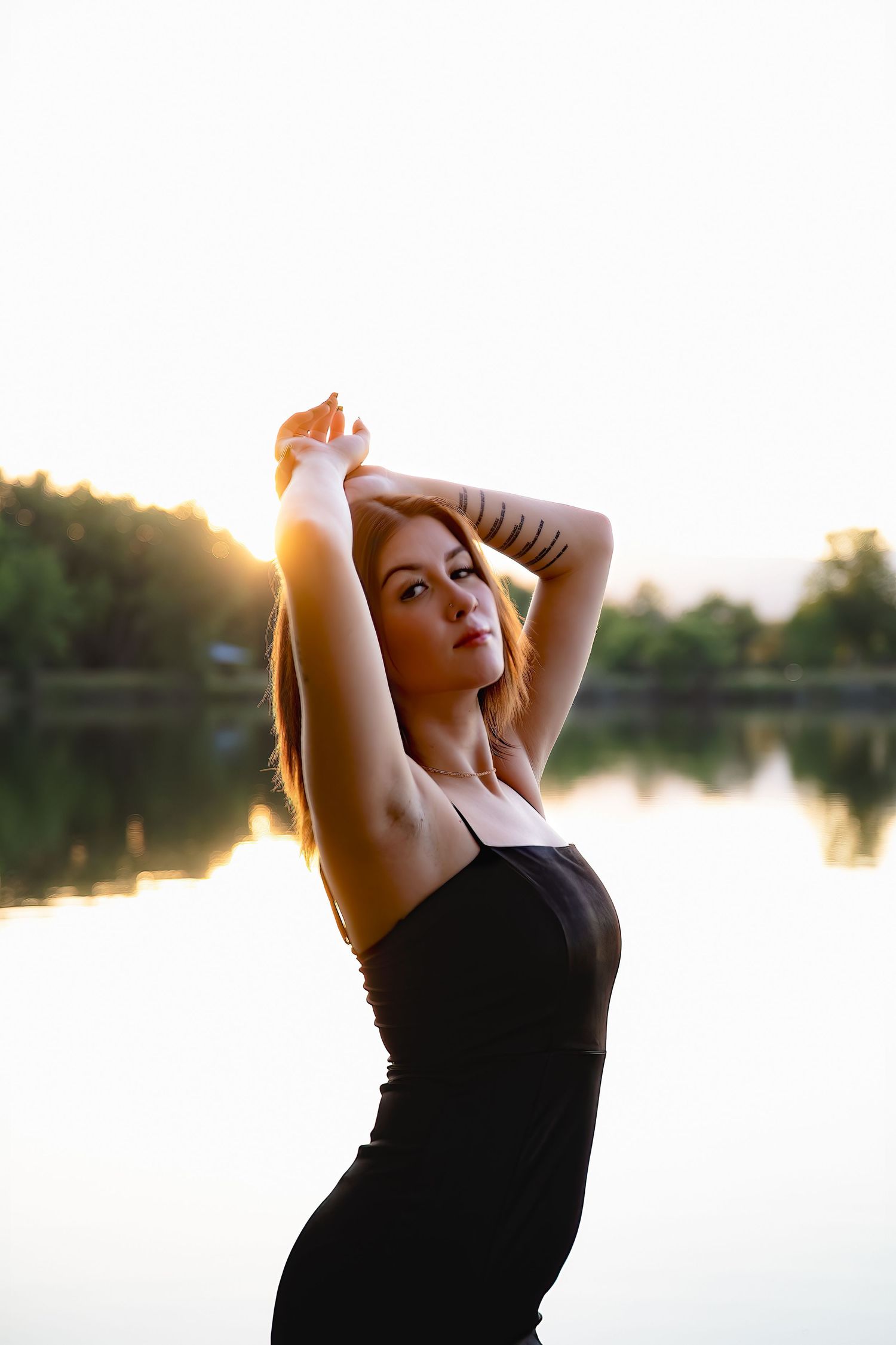 Capturing a senior's milestone in the beauty of Longmont: A portrait session at Golden Ponds.
