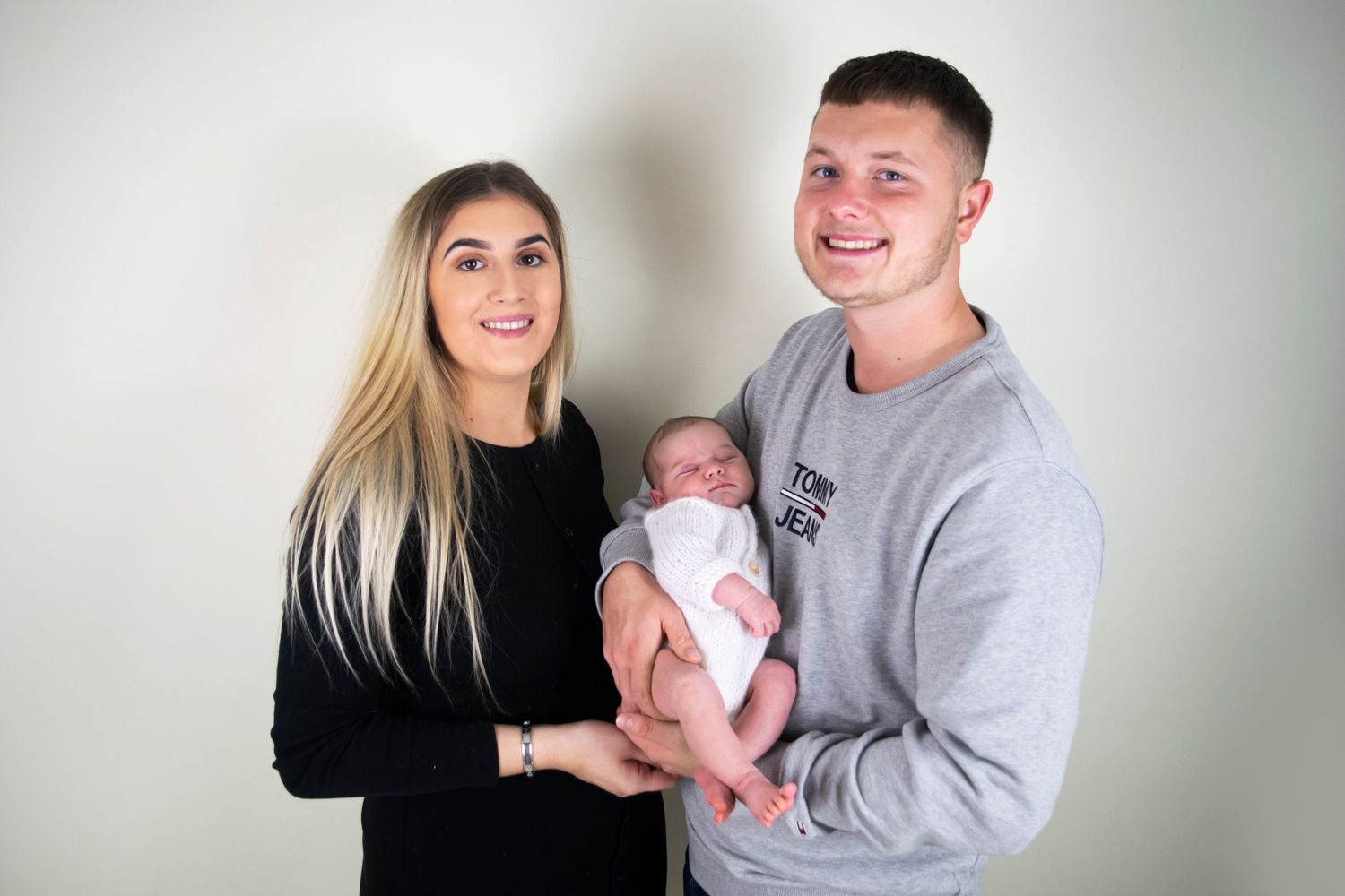 family portrait with mum dad and baby for family photos at newborn session taken by heather katie photography.