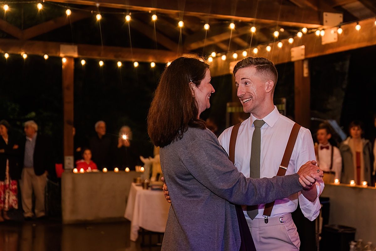 Photography of step mother and step son dancing at wedding
