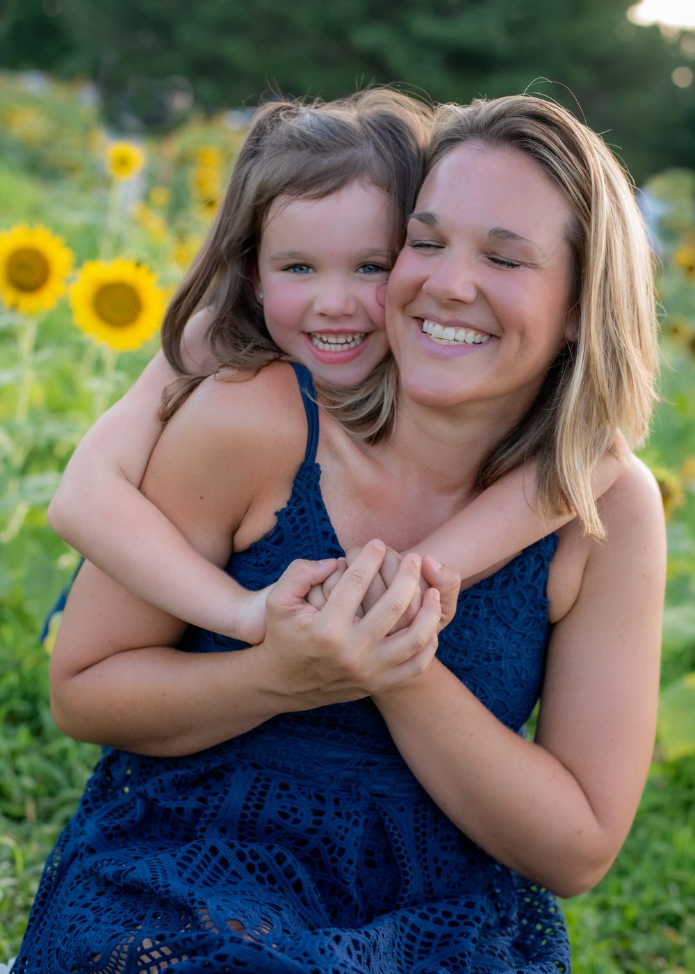 Dorothea Dix sunflower images, Dorothea Dix senior portraits, family pictures in the sunflowers, senior photography in Raleigh