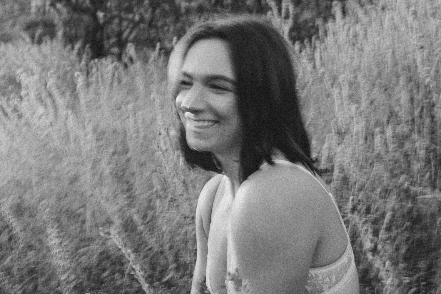 Perth photographer captures beautiful fit woman in the Australian native spring flowers in Perth Hills, Bells Rapids.