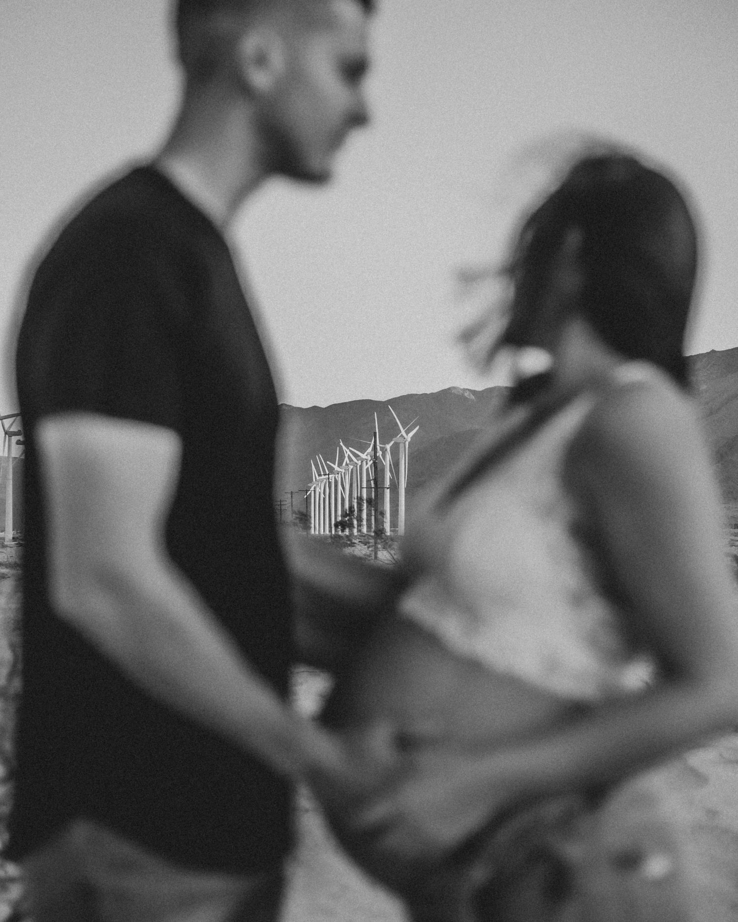 Maternity photography of couple by the windmills in Palm Springs, California