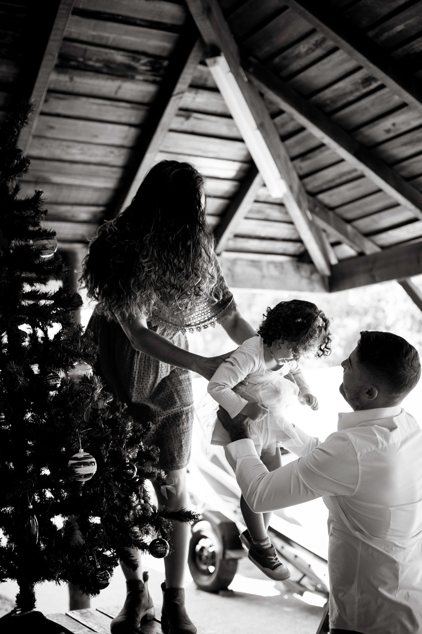 Parents take Lara down after finishing the Christmas tree decoration