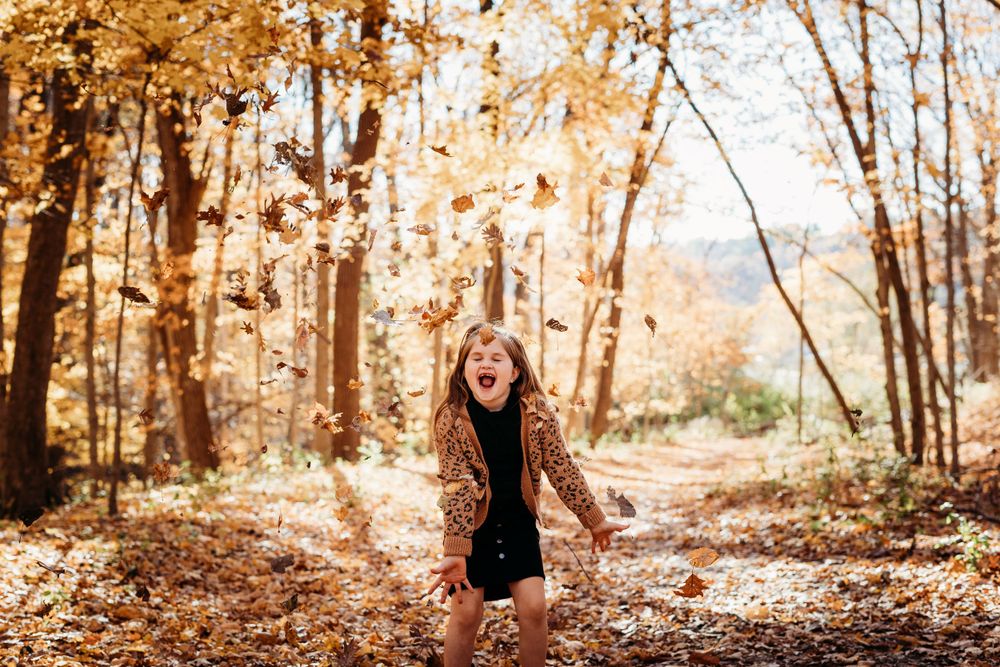family photos in the Coralville Iowa fossil gorge couple sage and ivy studio Oxford Iowa corridor Iowa fall sunset warm