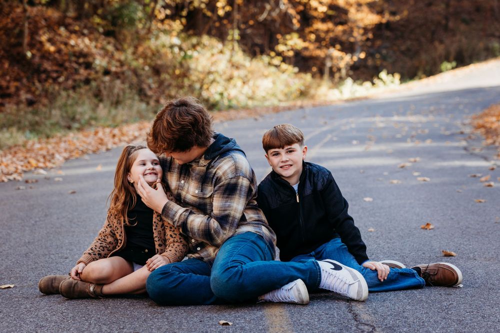 family photos in the Coralville Iowa fossil gorge couple sage and ivy studio Oxford Iowa corridor Iowa fall sunset warm