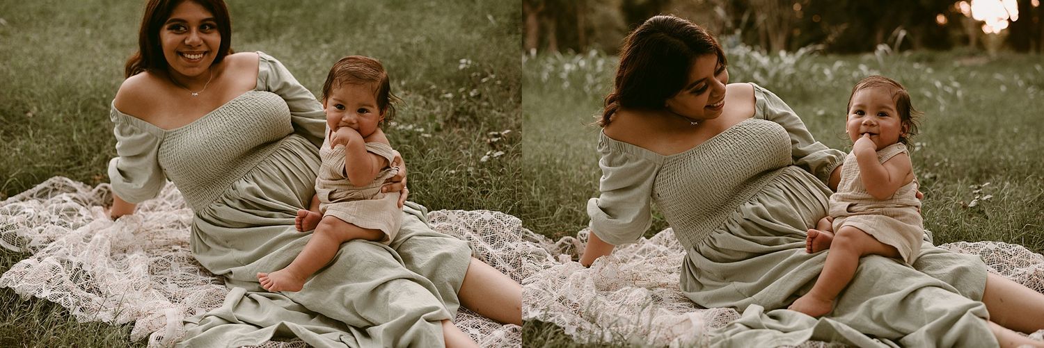 Natural light photos show parent and baby bonding on white lace during an outdoor session.