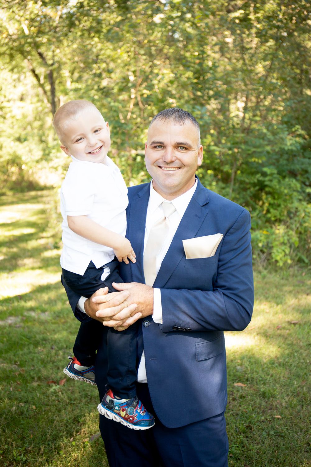 A joyful moment captured outdoors in natural lighting.