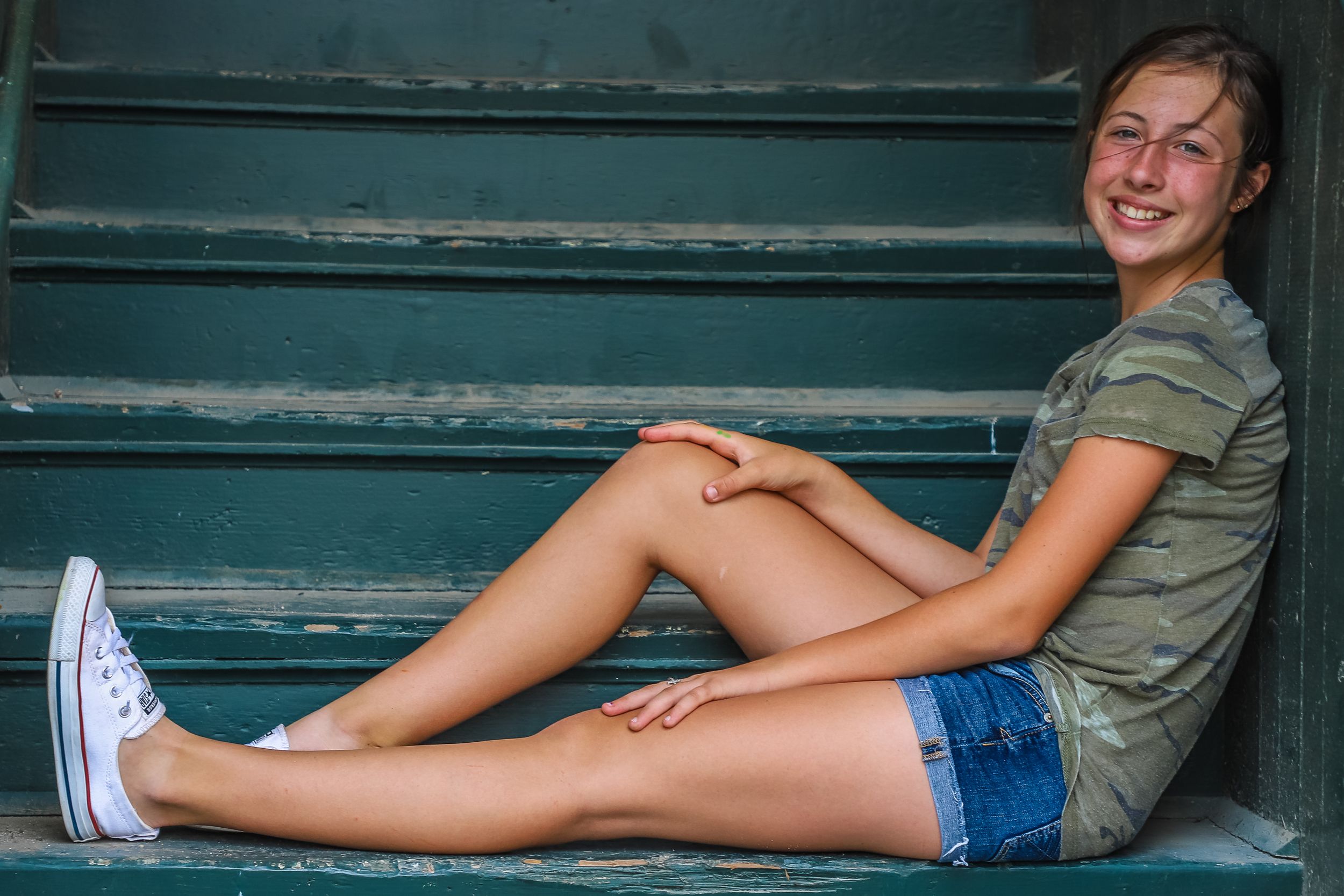 girl sitting on stairway portrait