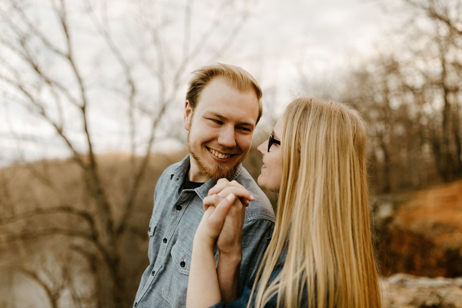 Lifestyle couples portrait in Joplin, Missouri with movement-focused posing and intimate storytelling.