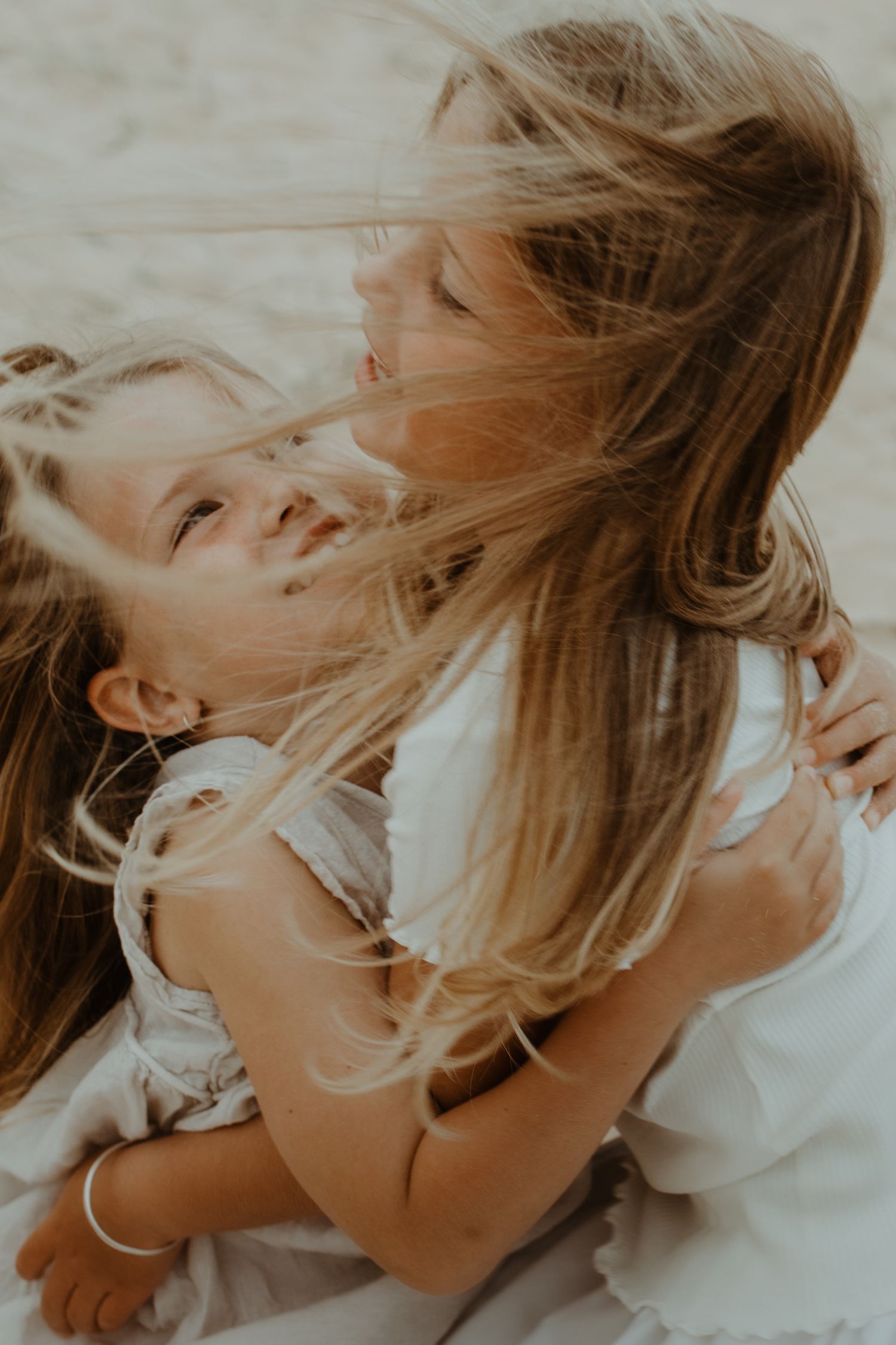 Family Photography Newcastle, Australia: Sisters Embracing