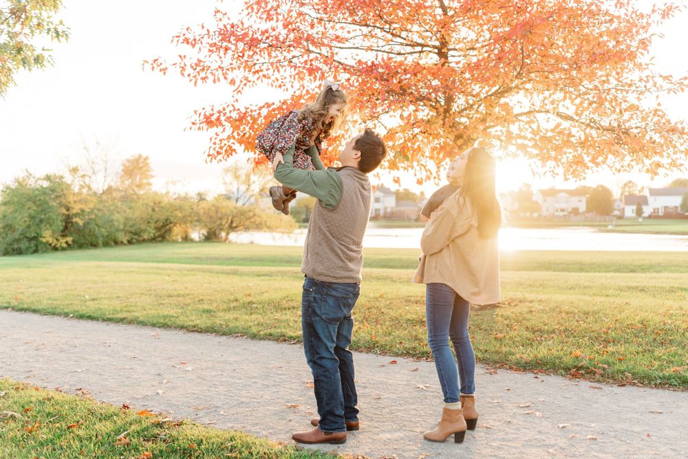 family looking up at girl