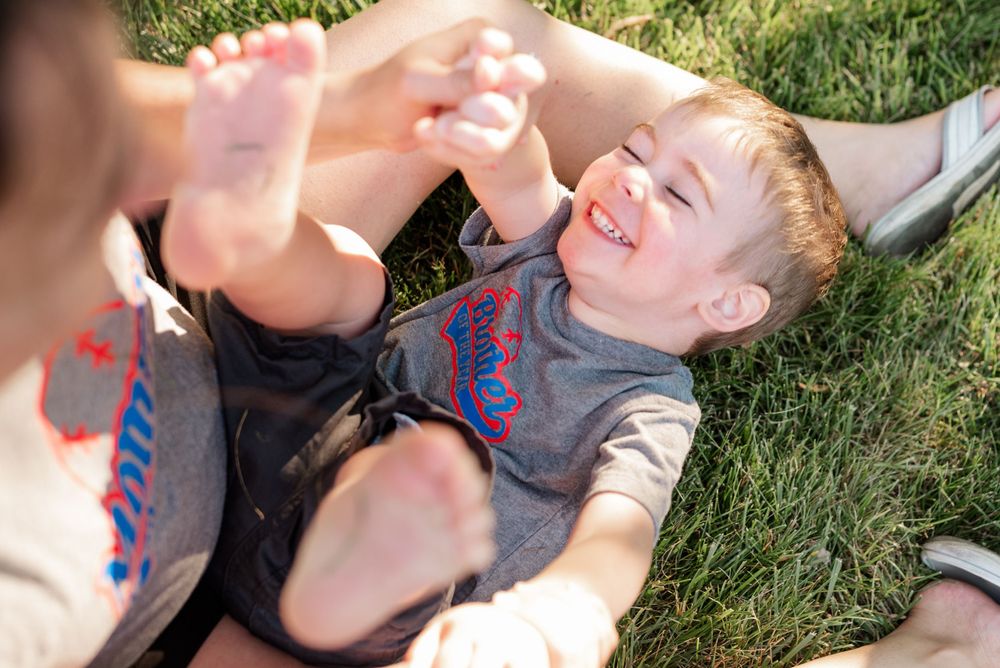 boy smiling and laughing