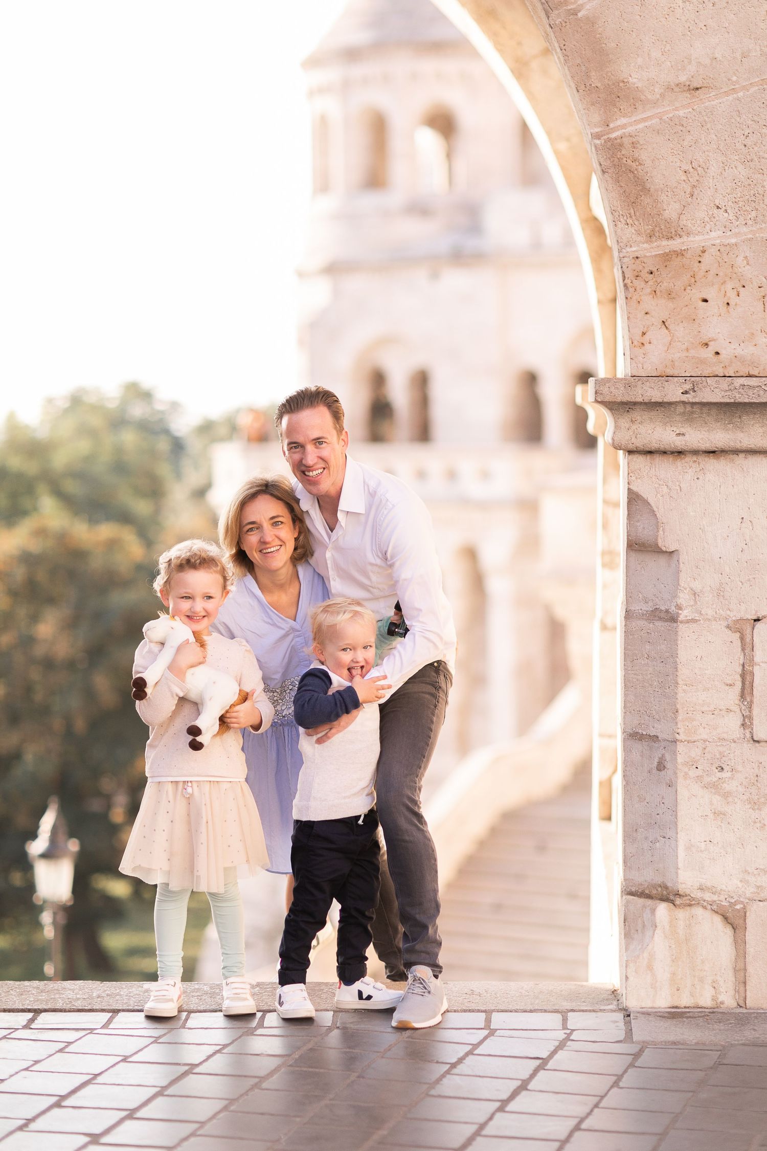 Family photoshoot at Fisherman’s Bastion in Budapest with scenic architecture, natural light, and joyful candid moments.