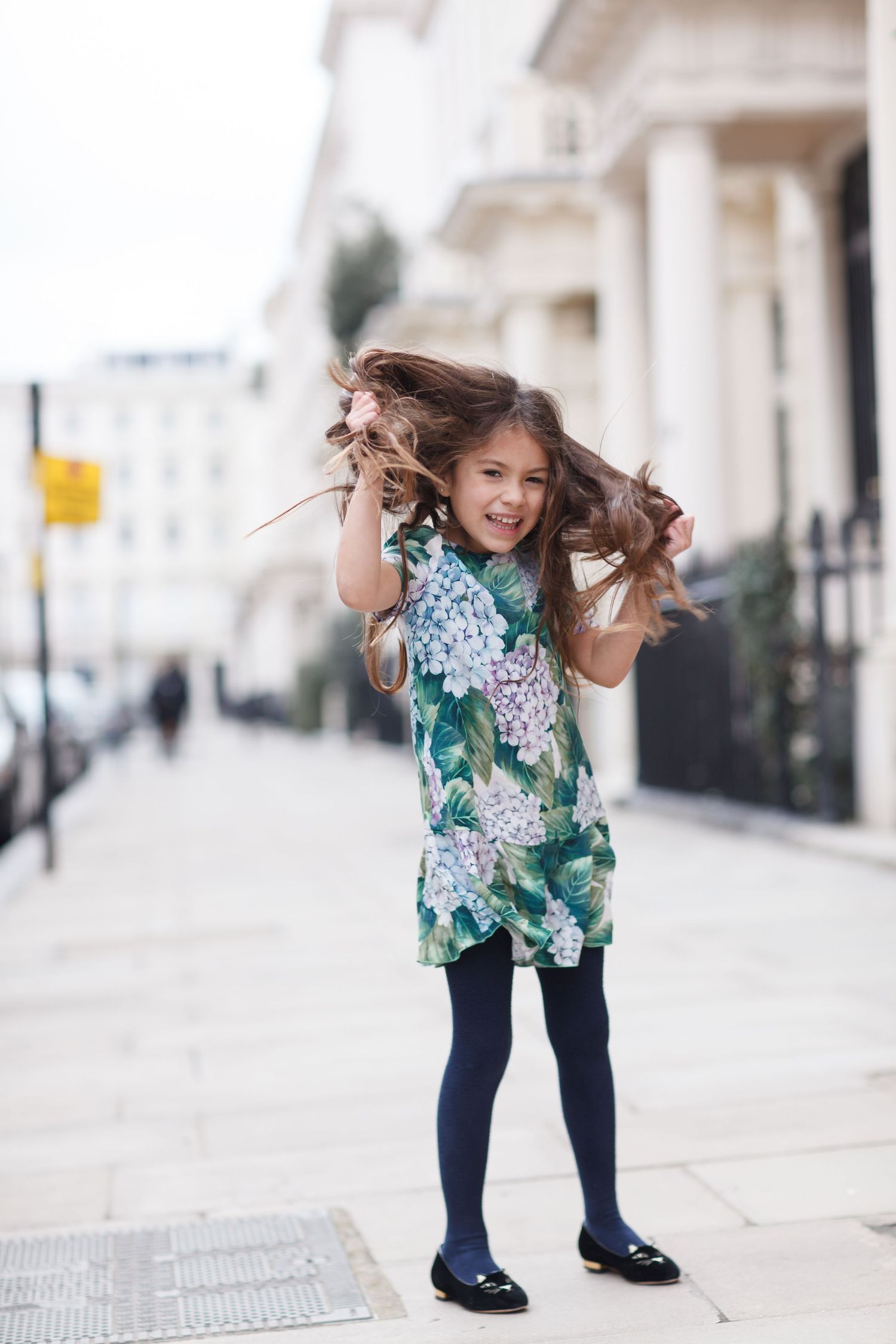 Family photoshoot at Fisherman’s Bastion in Budapest with scenic architecture, natural light, and joyful candid moments.