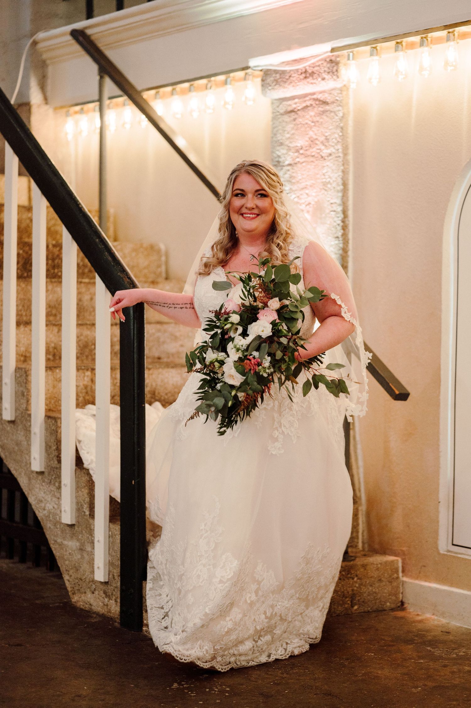 Bride descending stairs