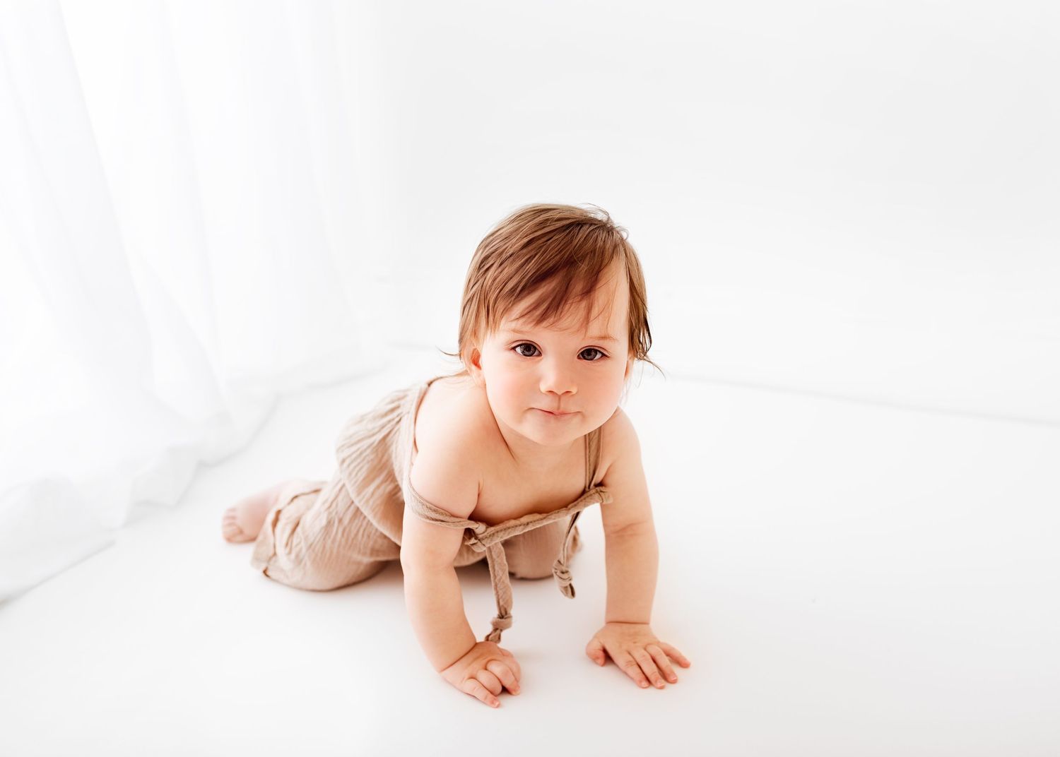 all white baby photos baby dungarees big window and curtain
