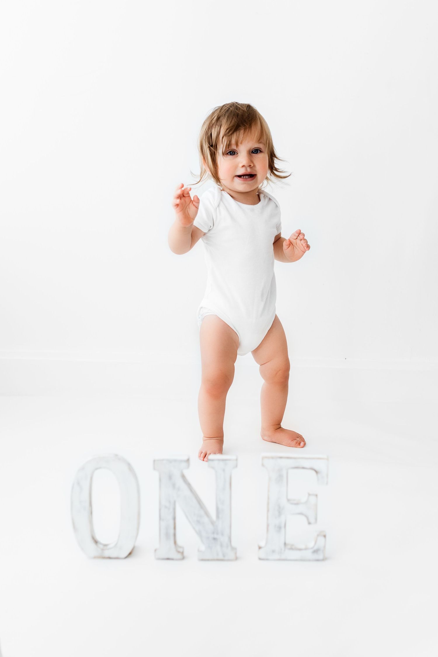 Natural all white baby first birthday photoshoot Hereford