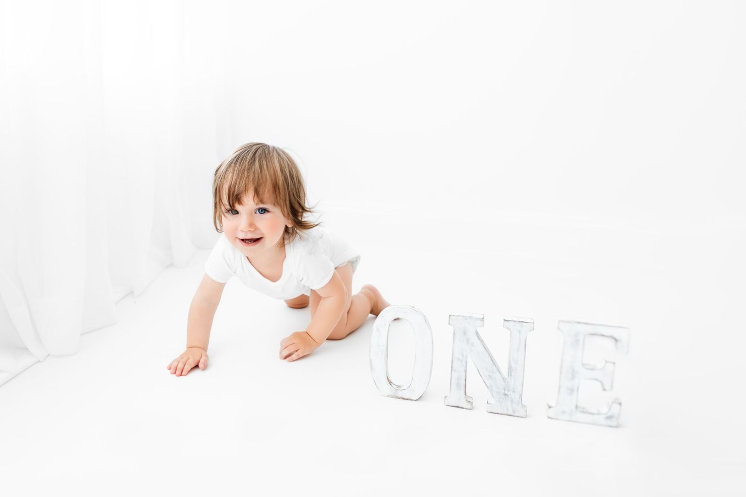 Natural all white baby first birthday photoshoot Hereford
