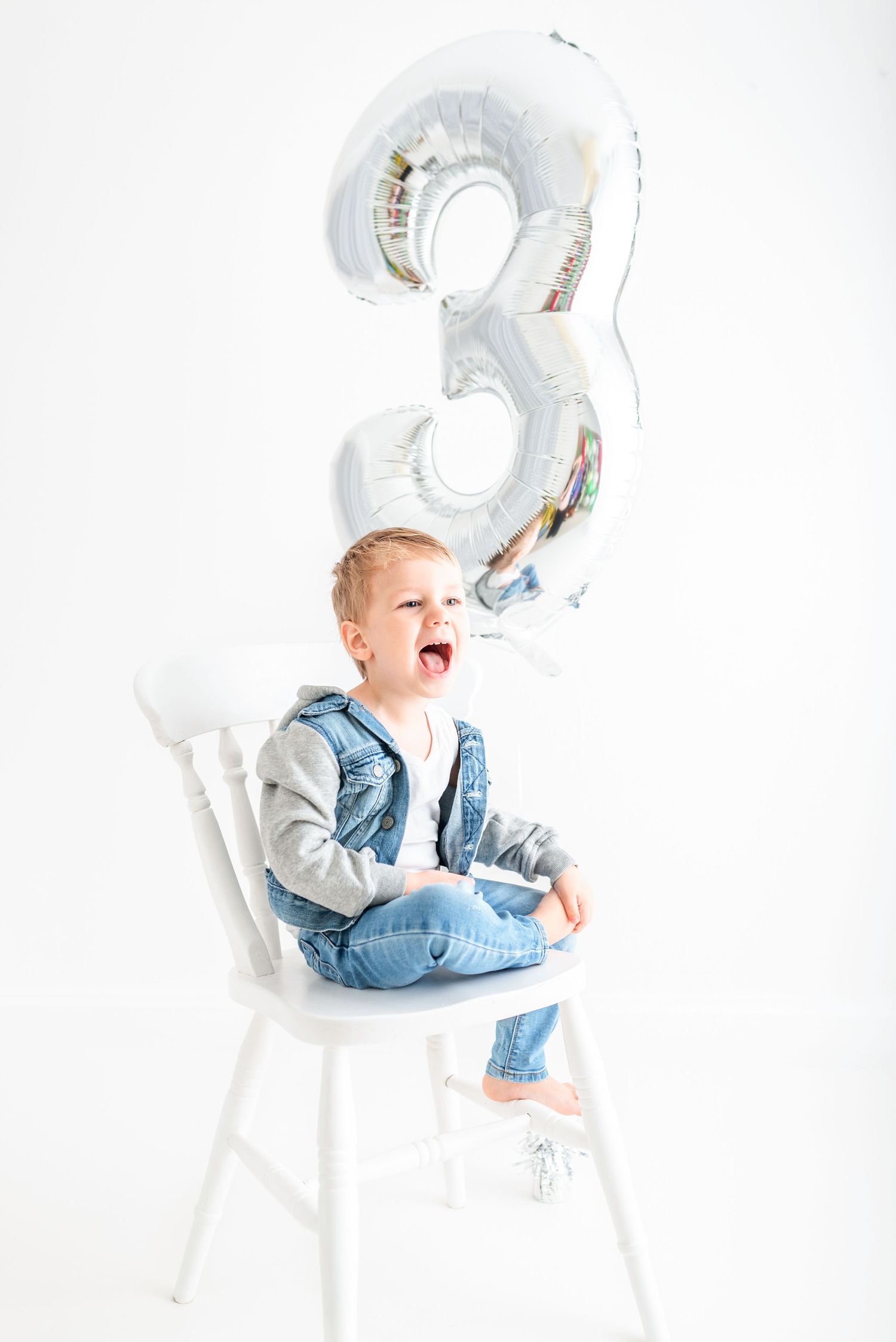 baby photo all white background boys third birthday photo