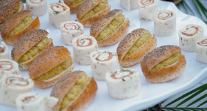 Platter of beautifully arranged pastries and desserts at a wedding reception.