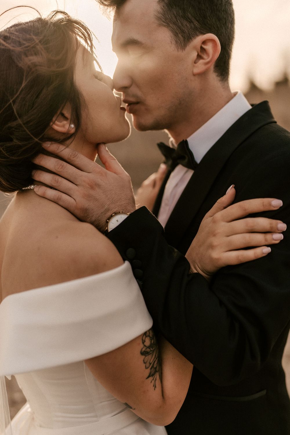 Warm-toned intimate wedding portraits showing tender moments and elegant details.