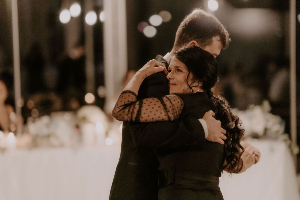 Intimate dance moments captured during an evening wedding celebration.