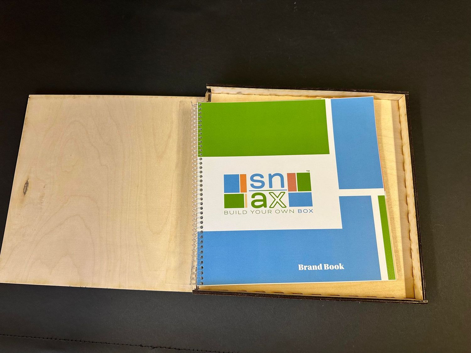 open box with closed Snax box inside