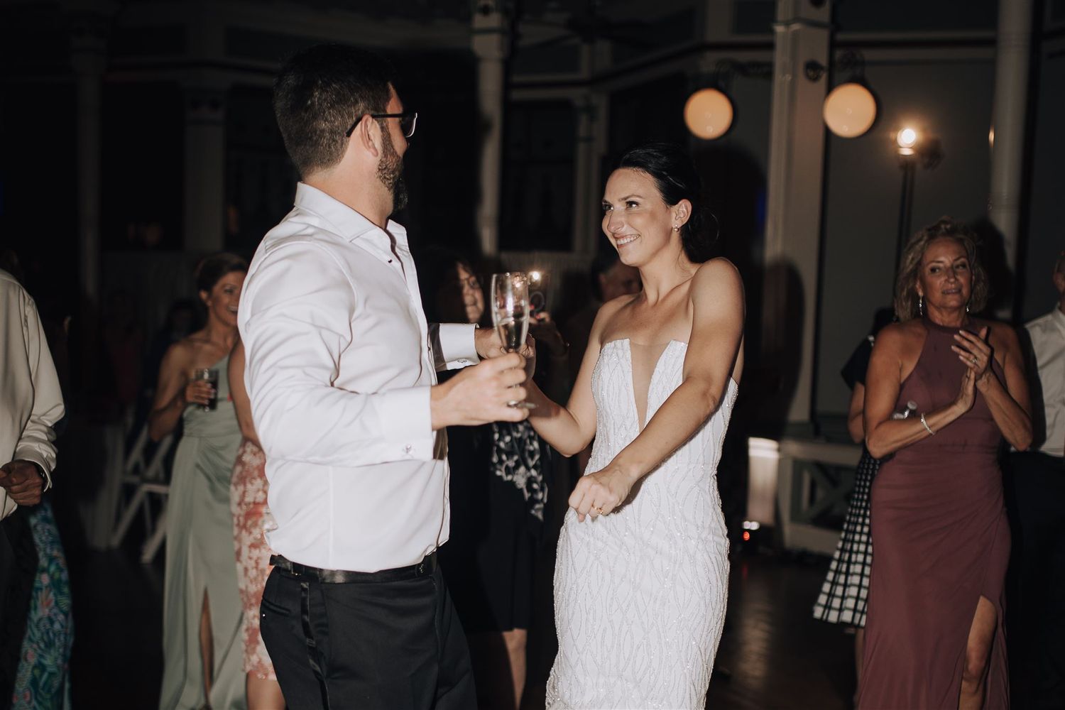 Couple sharing an intimate moment during their wedding reception dance.