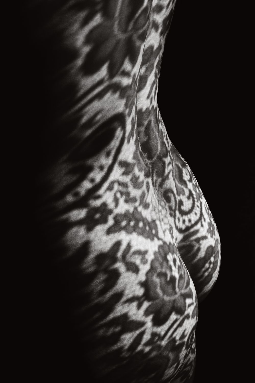 Contemporary and innovative artist, Heidi Unruh, reimagines the nude on black and white film.