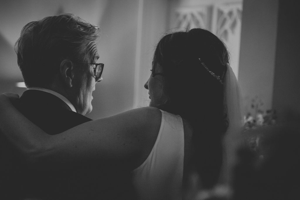 Bride hugging her dad