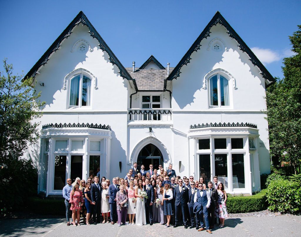 Wedding group shot outside Didsbury House Hotel