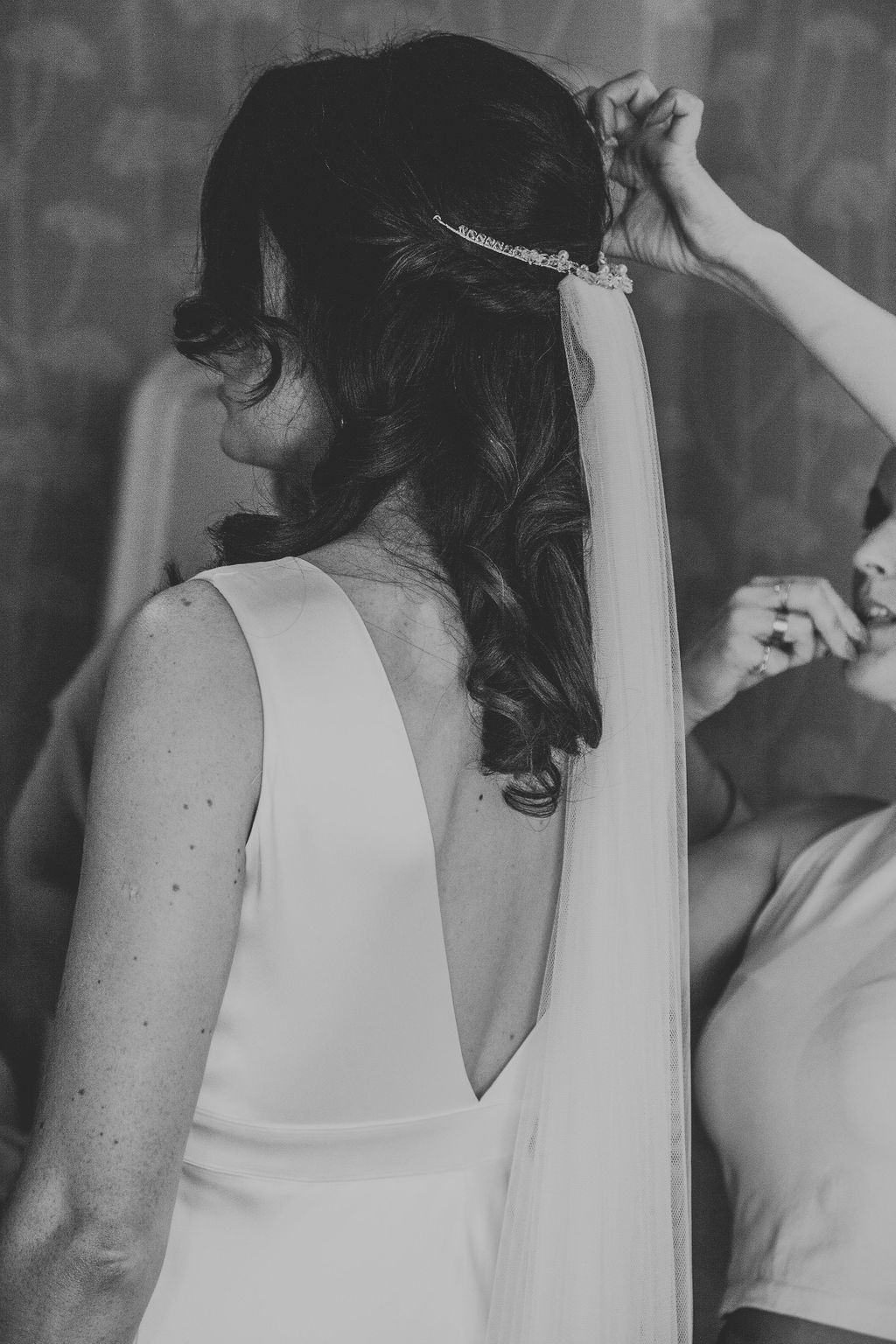 Bride and hairdresser