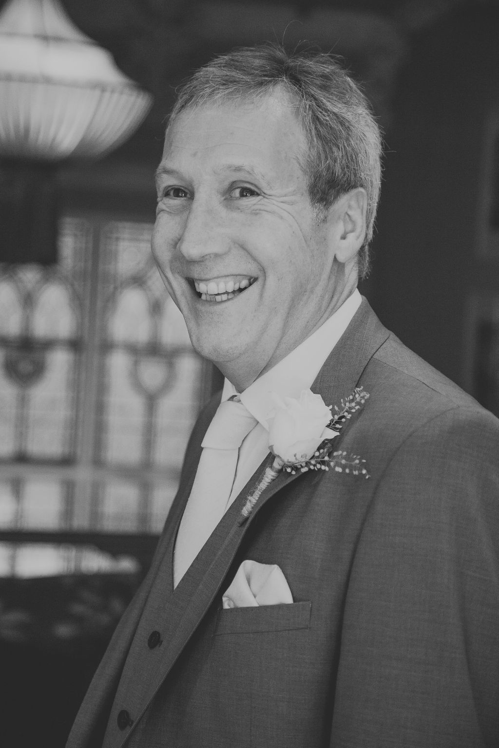 Laughing father of the bride