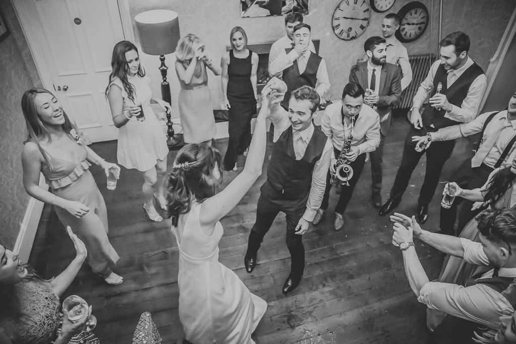 Black and White of bride and groom on the dance floor