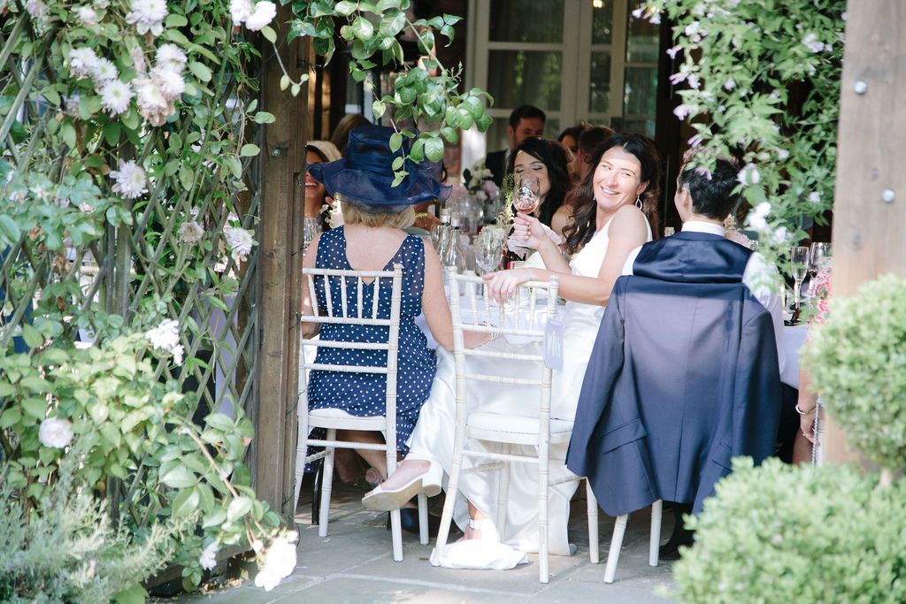 Back shot of bride and groom at the table