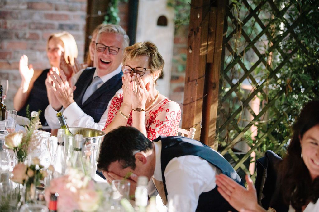Groom with his head in his at speeches