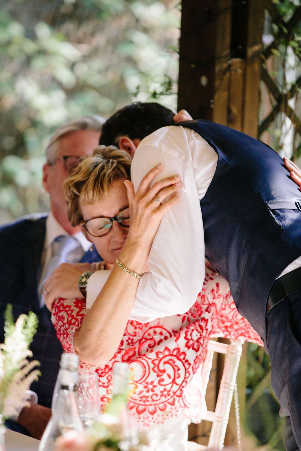 Groom hugging his mum