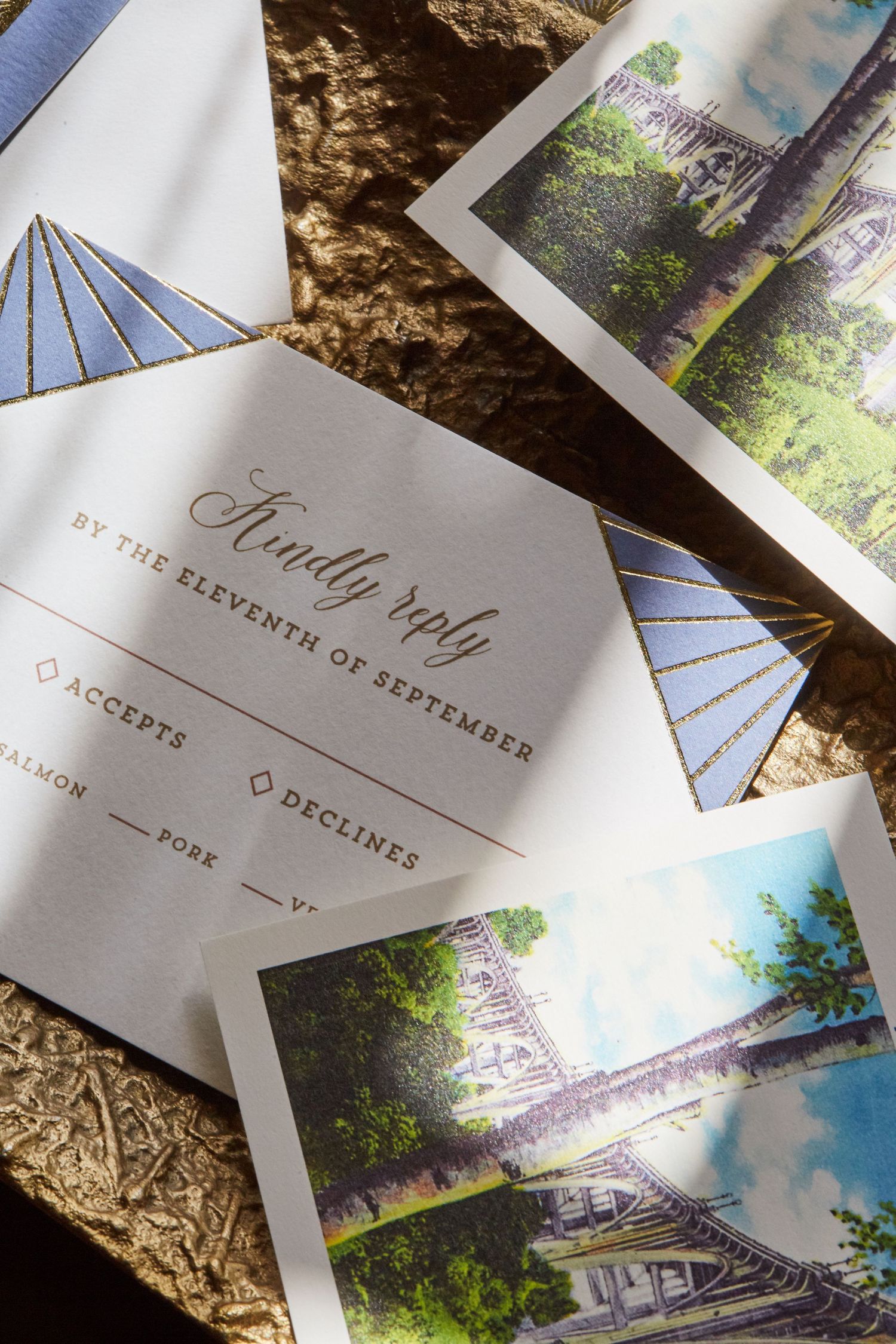 Wedding RSVP card with Art Deco design elements and scenic photo prints on textured background.