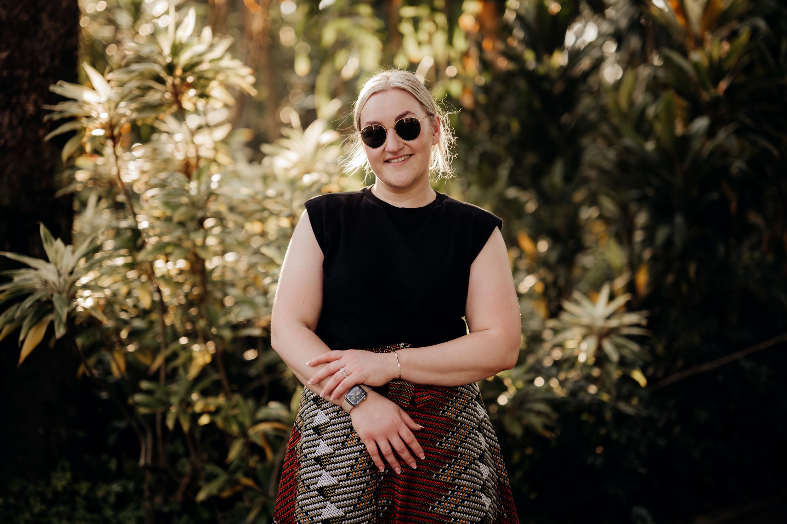 Outdoor portrait during sunset beaming through the leaves