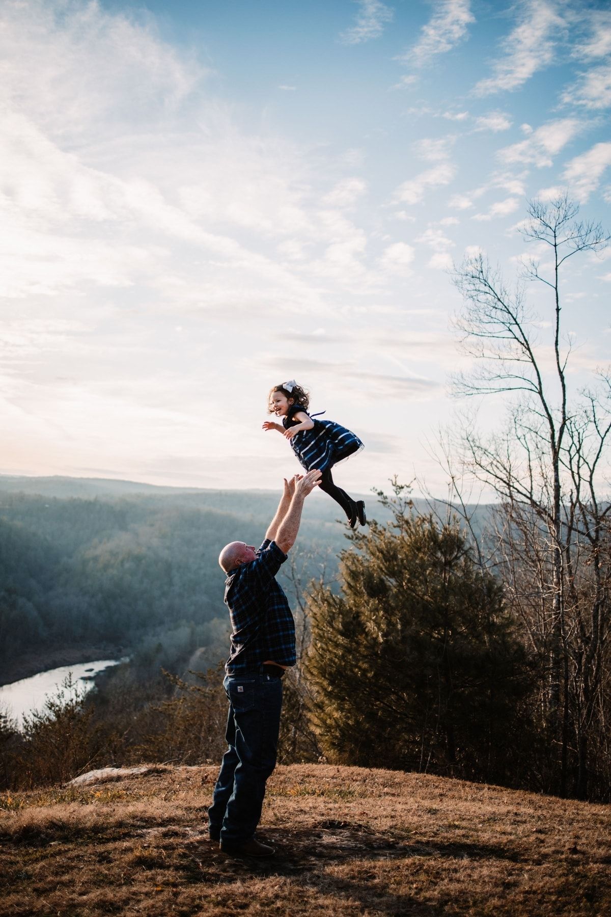 Beautiful moment between father and daughter in East Tennessee during their family session at their home.