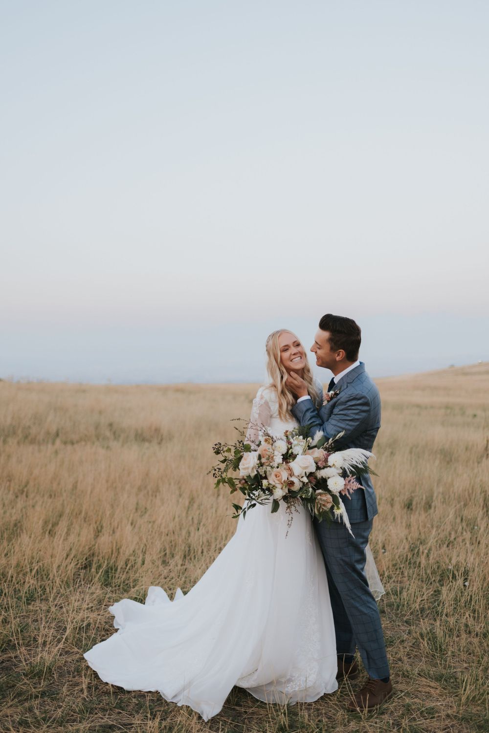 Bride and groom take their fall bridals near Tunnel Springs Park, captured by their talented Utah wedding photographer.